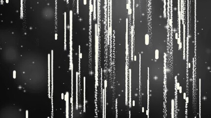 Sparkling light streaks falling elegantly against a dark backdrop, perfect for adding a touch of magic to your project