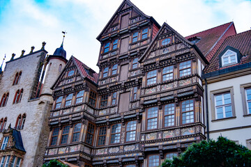 Ancient Hildesheim, Renaissance Wedekindhaus facade fragment, Old Market Square in Central Europe, Historic half-timbered 16th-century craftsmanship in Germany with ornate facade, Old German townhouse