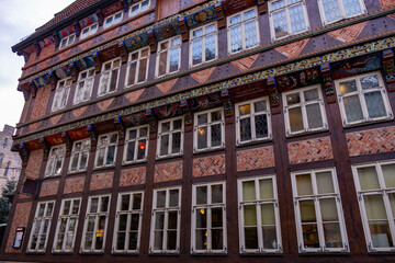 Ancient Hildesheim, Renaissance Wedekindhaus facade fragment in Central Europe, Historic half-timbered 16th-century house craftsmanship in Germany, Old German 1598s townhouse on Old Market Square