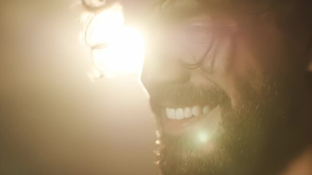 Sunlight glimmers off the flowing hair of a woman, creating a shimmering effect that enhances her beauty. The aura of warmth and softness envelops the scene, evoking a sense of tra