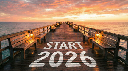 Naklejka premium Motivational new year start 2026 concept on wooden pier at colorful ocean sunrise, fresh beginning and goals.