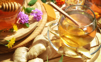 Glass cup with ginger honey and natural herbs drink