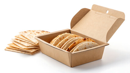 Cardboard box filled with flatbreads and a stack of flatbreads beside it