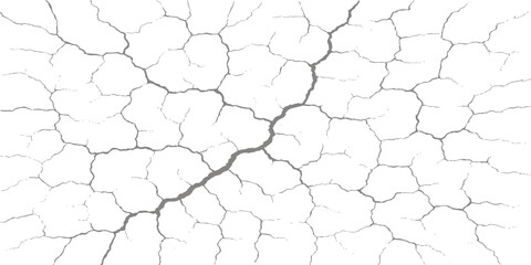 Abstract textured pattern of dry, cracked clay mud surface on an old brown concrete wall