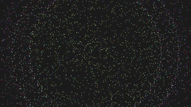 Colorful dots scattered on a black background creating a visually engaging and abstract composition. The randomness and vibrancy of the dots evoke a sense of artistry and whimsy