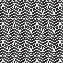 Geometric Harmony: A captivating display of interlocking zigzags and diamond-shaped pattern. the repeating design showcases an abstract of shape. 