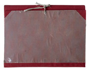 closed red file folder with thread rope binding on white