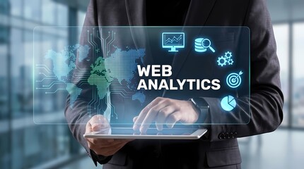 Business Professional Using Tablet for Web Analytics and Data Visualization