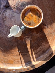 Enjoy a morning cup of coffee as the sun rises and prepare for your day