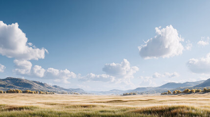 Fototapeta premium Wide rural landscape with plains and distant hills under a clouded sky, conveying openness and calm