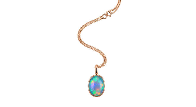 Isolated rose gold chain and oval opal gemstone pendant jewelry for women, no background