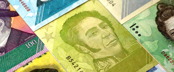 Venezuelan Bolivar currency money bills in big amount. Heap of VED currency banknotes with...