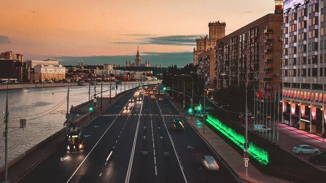 traffic in the city at night Busy city road with glowing lights, neon green-orange tones, dynamic urban framing, energetic mood High-definition urban and landscape time-lapse videos 