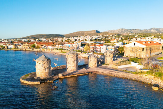 Ancient mills on Aegean sea shore in Chios island, Greece. Landmark on greek island Chios