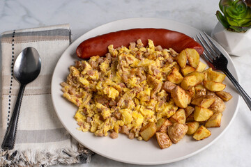 scramble eggs and corn beef hash  with  smoked sausage