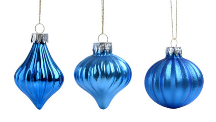 Three shimmering blue christmas ornaments hanging against a dark background