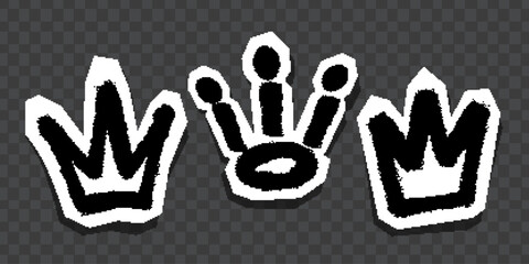 Graffiti-style black crown and symbol stickers with white outlines on dark background.