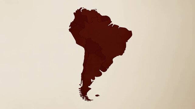 A stylized outline of South America in a deep red color against a light background.