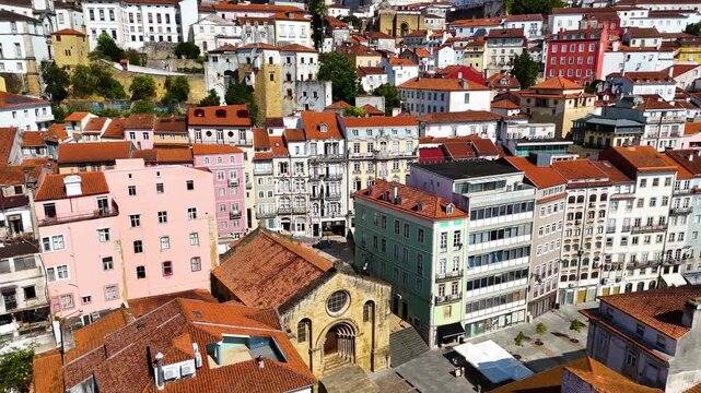 Aerial Drone View of Coimbra, Portugal &mdash; Historic City with Ancient University, Old Town Architecture, Scenic Mondego River, Cinematic Sunset Light, Portugal Travel and Panoramic Footage