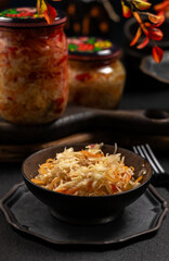 Bowl of fresh sauerkraut with carrots and cabbage