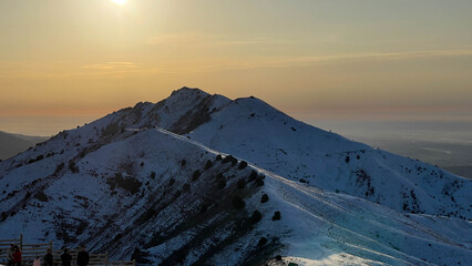 Sunset over the mountain peak