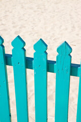Detail of a green wooden fence