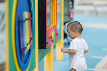 Happy baby spend time at open park