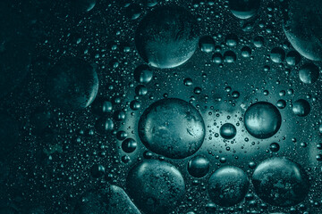 Abstract background with blue bubbles in liquid. Top view with many shapes and textures, suitable for design or creative projects.