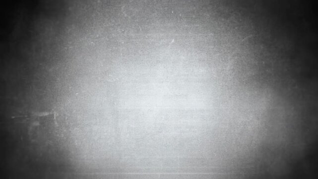A textured gray background with subtle variations and a soft sheen.