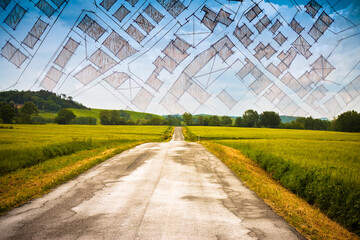 From nature to a new city - concept image with a rural scene that fades on the map of an imaginary city map with buildings and roads - nature becomes a city