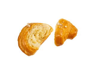Close-up of cut croissant highlighting flaky layers and airy texture. Perfect for bakery ads and packaging. 