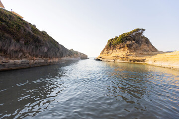 Canal d'amour sea channel rock formation and beach in Corfu, Greece