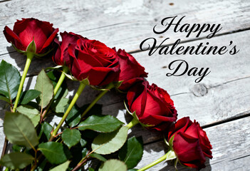Happy Valentines Day holiday poster, flyer, greeting card, love, mothers day, red roses on rustic wooden background