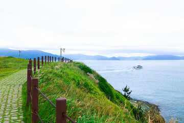 Windy hills and seascape.
