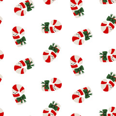 Delicate seamless pattern with fun striped sugar canes with green holiday bows. Flat color texture for holiday packaging, gift wrapping, Christmas party invitations, and seasonal pastry branding.