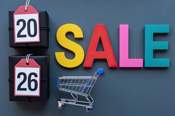 Colorful 2026 Sale Announcement with Gift Boxes and Mini Shopping Cart on Dark Background