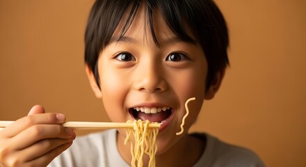 a delightful moment captured as a young asian child joyfully consumes a strand of noodles with chopsticks eyes sparkling with delight high quality professional detailed modern