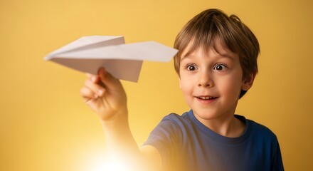 a young boy with brown hair excitedly launches a white paper airplane forward with a joyful expression on a bright yellow background high quality professional detailed
