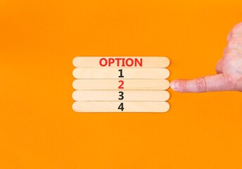 Time to option 2 symbol. Concept word Option 1 2 3 4 on beautiful wooden sticks. Businessman's...