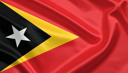Timor-Leste flag with red field, black and yellow triangles, and white star in center.