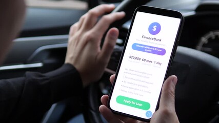 Closeup of a mans hands in a parked car carefully reviewing the terms and conditions for an online loan offer on his smartphone. This contemplative moment captures the serious consideration behind - Powered by Adobe