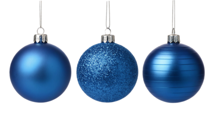 Three shiny blue christmas ornaments with different textures hanging on silver strings isolated on transparent background