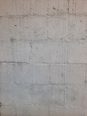 Texture of old rustic wall covered with gray stucco plaster