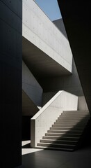 Modern concrete staircase with dramatic shadows and bright sunlight in architectural building.