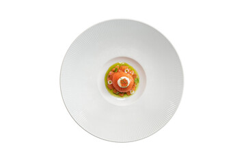 An elegant top-down shot of a gourmet dish artfully arranged on a round plate