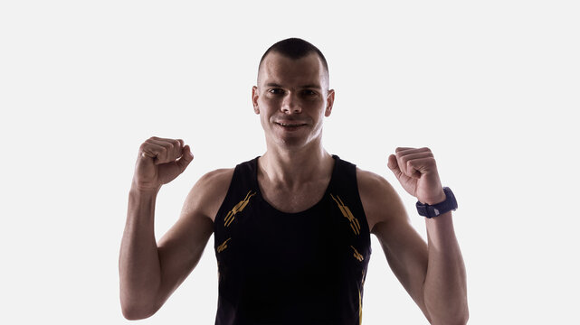 Runner celebrating training achievement. Concept of motivation platforms, progress-tracking apps, coaching presentations, and sports program marketing. - Powered by Adobe