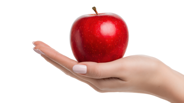 Fresh, vibrant red apple held in a human hand with a clean, white background for emphasis.