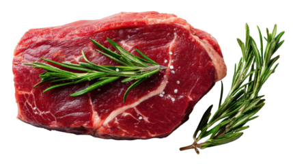 Fresh cut of beef steak garnished with rosemary on a white isolated background.