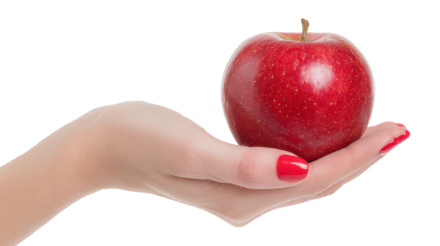 Red apple held in a hand with manicured nails, isolated on white background.