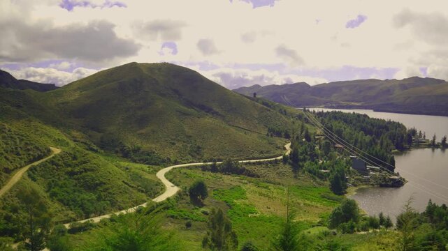 lagoon surrounded by pine trees, with a mountain surrounding, Corani Lagoon, Cochabamba, Bolivia. 